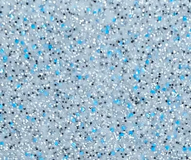 Close-up view of a speckled surface featuring a mix of white, black, and bright blue flecks.