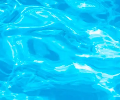 Close-up of rippling bright blue water.