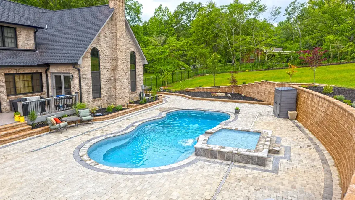 The Elation long freeform pool with rounded entry steps