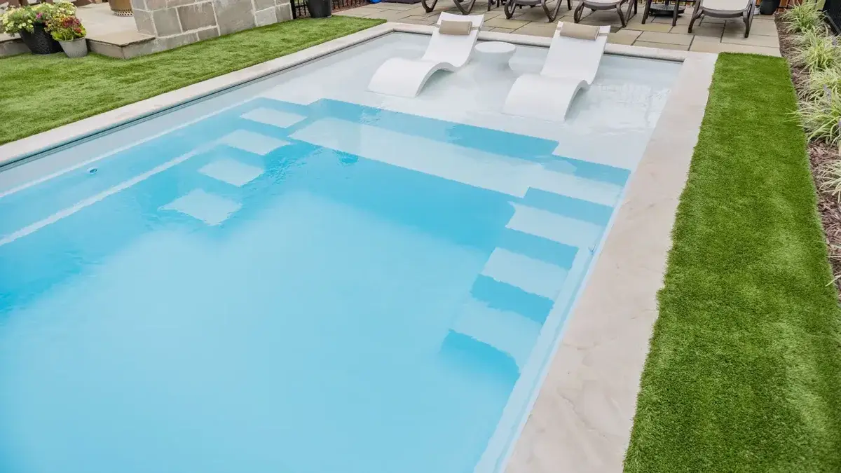 The Freedom with Splash Pad fiberglass swimming pool